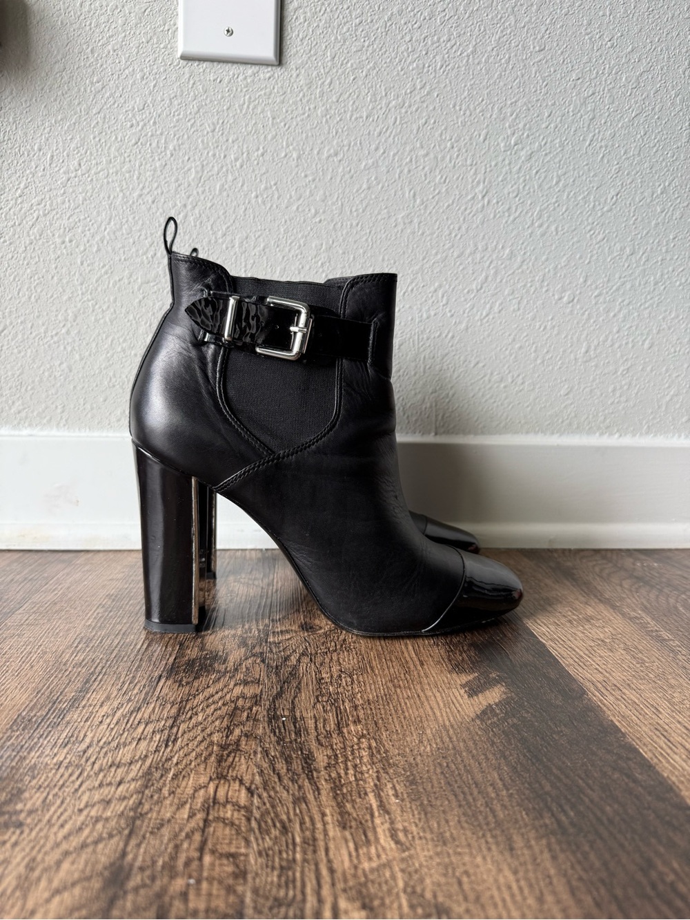 Pour La Victorie Black Leather High-Heel Ankle Boots with Buckle